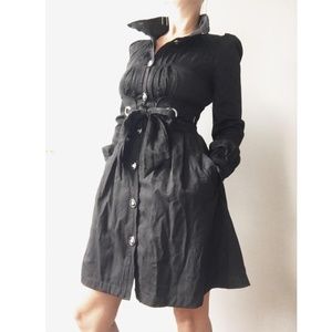 Long sleeved, black dress with pockets